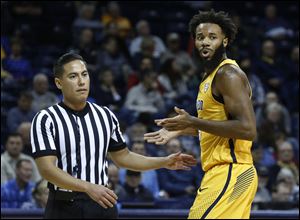 SPT UTMBB17  25/16/2017    Toledo's Tre'Shaun Fletcher questions his charging call during second half of the basketball game against Wright State at the University of Toledo's Savage Arena in Toledo, Ohio.  THE BLADE/LORI KING