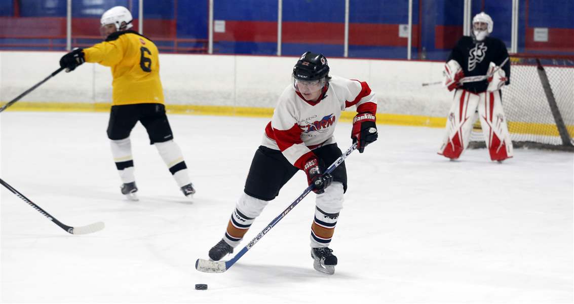 Adults drop in to play hockey The Blade