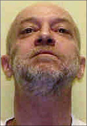 This undated file photo provided by the Ohio Department of Rehabilitation and Correction shows death row inmate Raymond Tibbetts, convicted of fatally stabbing Fred Hicks in 1997 in Cincinnati.