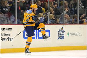 Toledo's Ryan Obuchowski (14) celebrates a goal during Sunday's game.