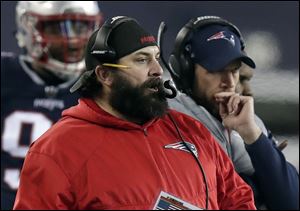 New England Patriots defensive coordinator Matt Patricia watches the AFC Championship against the Jacksonville Jaguars on the sideline. The Lions made their hiring of Patricia as their head coach official Monday.