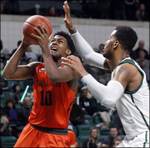 Bowling Green State University's Justin Turner, shown in a road win at Eastern Michigan earlier this season, scored 23 points in the Falcons loss at Buffalo Friday.