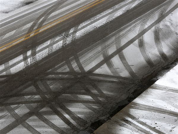 Slick road conditions force area school delays, closings
