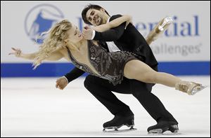 Madison Hubbell, left, and Zachary Donohue perform during their free dance program last month.