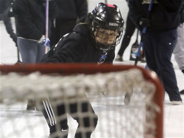 Special Olympics athletes take part in broomball games