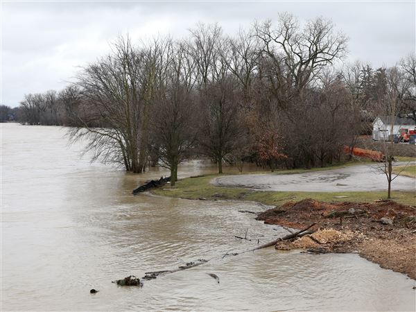 Tuesday's record warmth long gone, but region's river flooding persists