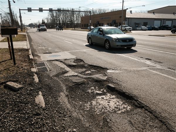 Toledo's plentiful potholes irk motorists