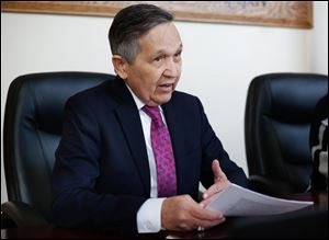 Democratic gubernatorial candidate Dennis Kucinich meets with the Blade editorial board Thursday. He said a regional water authority is a bad idea for Toledo.