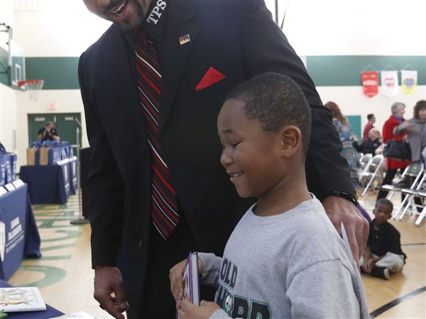 Philanthropy group donates more than 1,000 books to TPS students