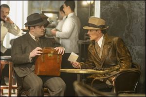 Josh Gad and Johnny Depp in a scene from 