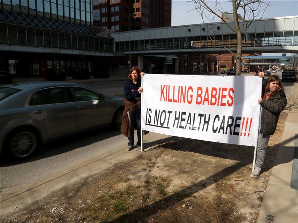 PHOTO GALLERY: Protestors call on ProMedica to undo transfer agreement with Capital Care abortion clinic