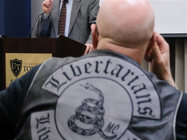 Protesters interrupt speech by gun rights advocate at UT