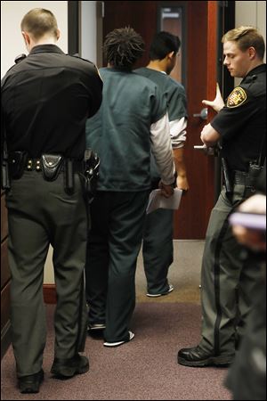 The four juveniles involved in the death of Marquise Byrd are led out of the courtroom following their sentencing Friday, April 6, 2018, by Lucas County Juvenile Court Judge Denise Navarre Cubbon in downtown Toledo. Demetrius Wimberly, William Parker II, Sean Carter, and Pedro Salinas were sentenced to the Lucas County Youth Treatment Center for their roles in the December 19, 2017, incident that caused fatal injury to Marquise Byrd. 