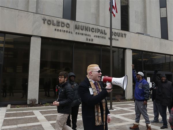 Protesters march in Toledo against police misconduct