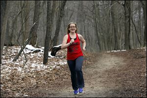 Sarah Helbig will be running a half marathon at the Glass City Marathon on Sunday. She has lost 125 pounds so far in her journey for a healthier life, and discovered along the way that she loves to run.