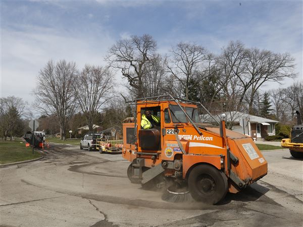 Crews begin 'mill and fill' repairs along West Toledo's residential streets