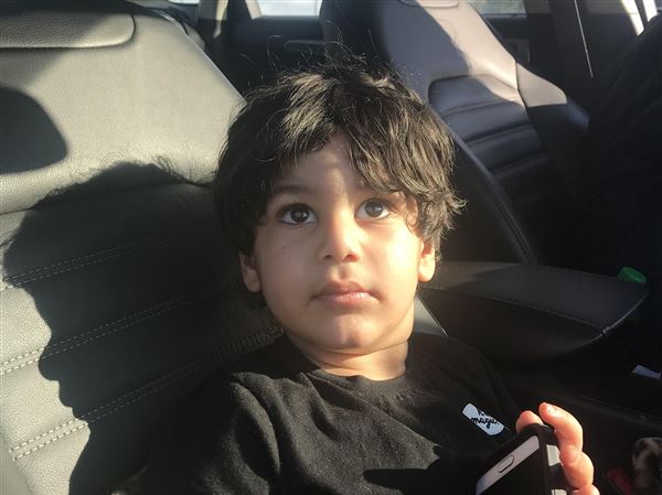 Boy found walking by himself reunited with family
