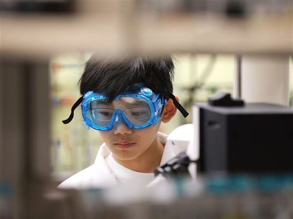 Boy genius, 12, matches wits with professors in UT lab