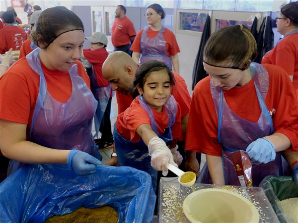 PHOTO GALLERY: Making an impact with meals for the hungry