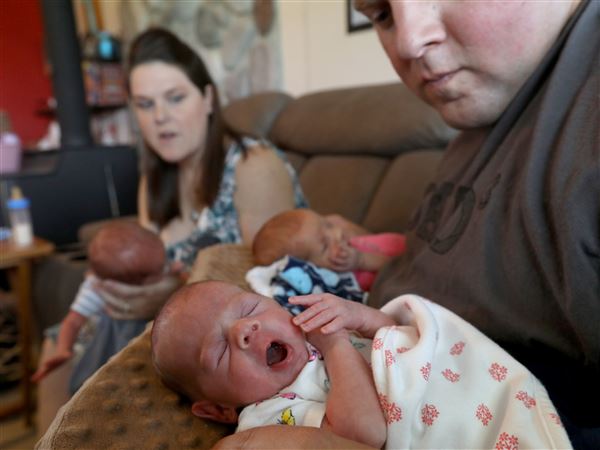 After years of infertility, Delta couple give birth to triplets
