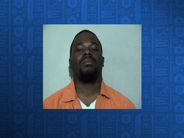 Toledo's gang task force arrests central city man