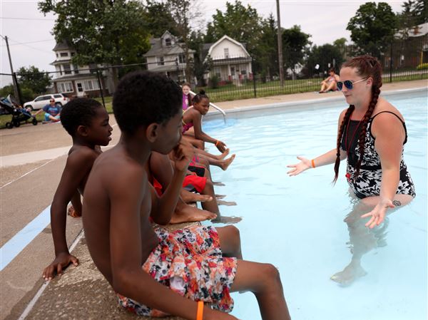 PHOTO GALLERY: Local kids learn to swim in 'World's Largest Swimming Lesson'