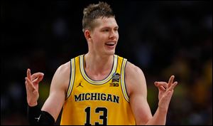 Moritz Wagner, who helped Michigan to the national championship game last season, was selected with the 25th pick in the first round of Thursday's NBA Draft by the Los Angeles Lakers.