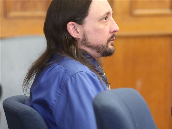 Witness: Neighbor on trial for murder was 'trying to protect us'