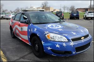 An Adrian Police Department vehicle. The department will host an auction of impounded vehicles July 21.