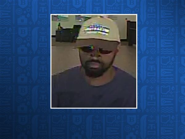 Authorities search for bank robber