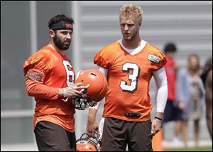 St. John's Jesuit graduate and Cleveland Browns quarterback Brogan Roback (3) talks with fellow quarterback Baker Mayfield during practice Wednesday, June 13, 2018. Roback threw a touchdown pass in Thursday's preseason win over the Detroit Lions.