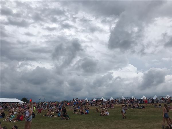 Rain can't stop fun, music at Faster Horses Festival