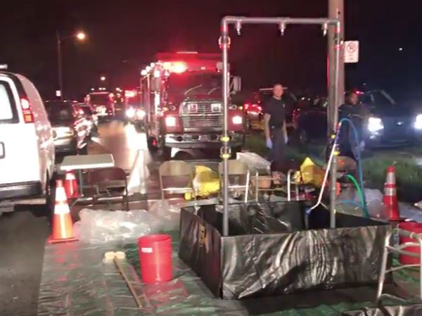 5 Toledo police officers, 11 others treated at hazmat situation