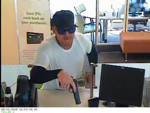 Police search for armed robbery suspect