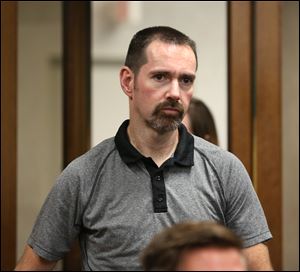 Chad Plummer, a former HCR ManorCare employee, appears in Toledo Municipal Court on Tuesday.