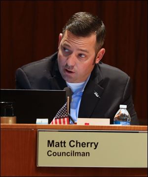 Toledo City Council President Matt Cherry’s delayed vote on a permit for a solar array panel has drawn controversy.