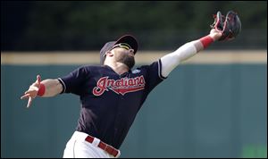Cleveland Indians' Jason Kipnis catches a ball hit by Baltimore Orioles' Austin Wynns in the seventh inning.