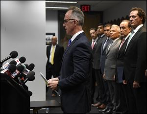 Brian McKnight of the Drug Enforcement Administration and various members of the Mexican government unveiled strategies for combating Mexican drug cartels during a news conference last week.