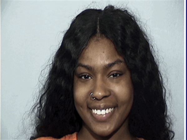 North Toledo woman accused of setting garage on fire