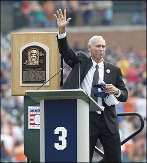 Detroit Tigers Hall of Fame inductee Alan Trammell waves after addressing fans during a pre-game ceremony where his number was retired at Comerica Park.