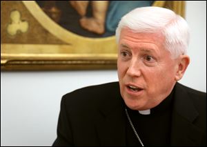 Bishop Daniel Thomas speaks during an interview at the Diocese of Toledo in Toledo on Monday.