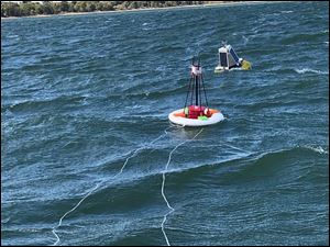 Aquatic sensor technology to access water quality in real time is used in buoys developed by the MicroBuoy team of Wayne State University.