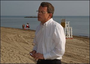 Mike DeWine, then a United States Senator, speaks on the shores of Lake Erie at East Harbor State Park in Port Clinton in 2004.