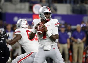 Ohio State quarterback Dwayne Haskins (7) looks to throw against TCU during the first half of Saturday's game.