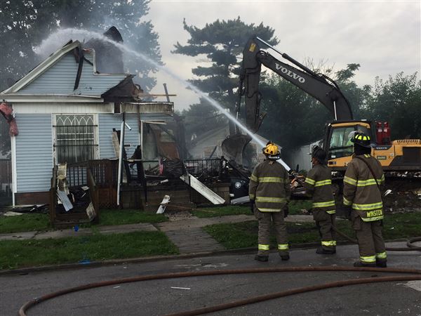 Suspicious fire, explosion destroys three houses in North Toledo