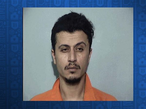 South Toledo man charged with trying to kill his wife