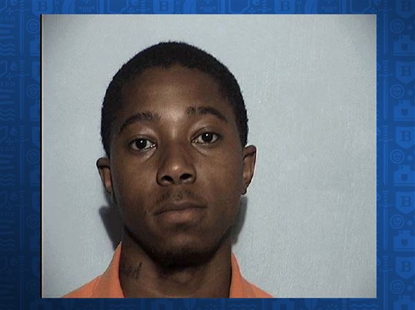Man faces charges for robbing, shooting at other man