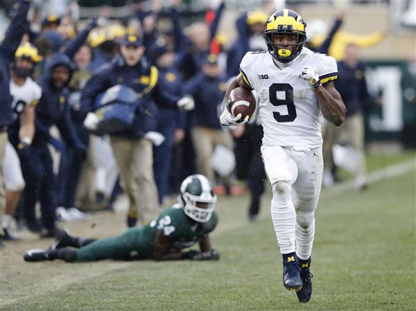 Michigan comes alive after Spartans throw scare into rival