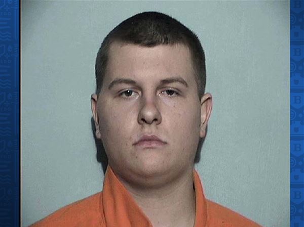 Man accused of robbing, shooting, another man