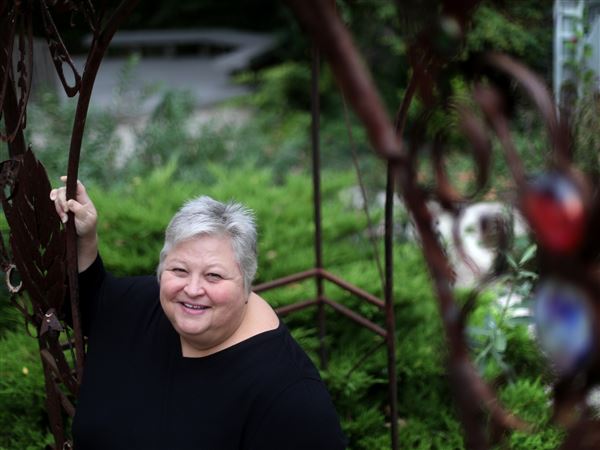 A fatal robbery in her family's past, woman says she supports Issue 1
